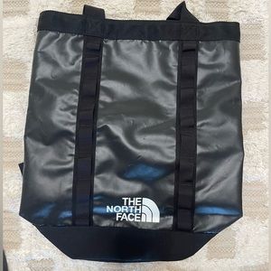 North Face Explorer Travel bag. Black. Draw string top closer.